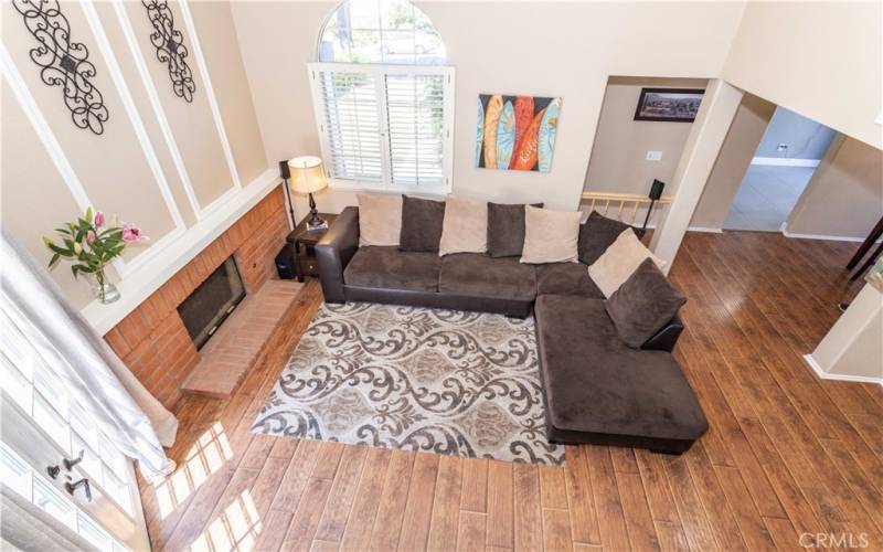 High ceiling view from top of stairs.