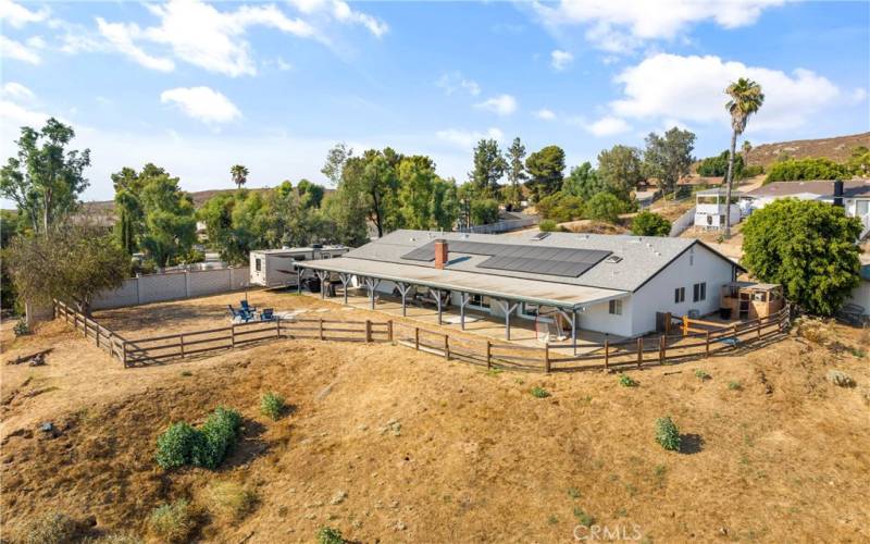 Aerial of back yard and back of the house.