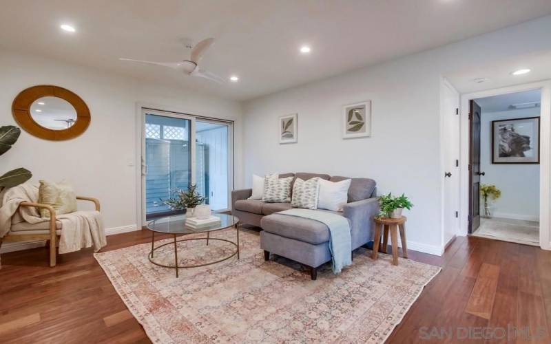 half bath, living room, and garage access