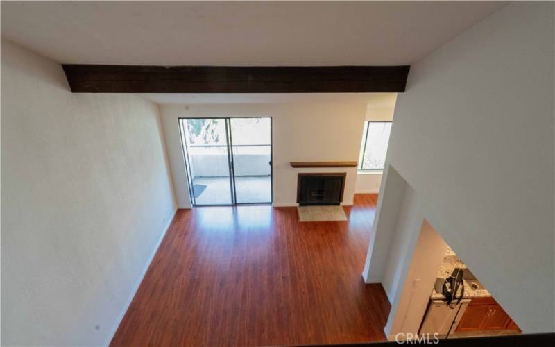 From Family Room/Loft, view of the great room, kitchen and dining area.