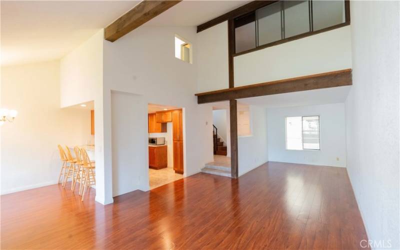 Entry, stairway, kitchen, East view of great room and window from the Loft/Family room.