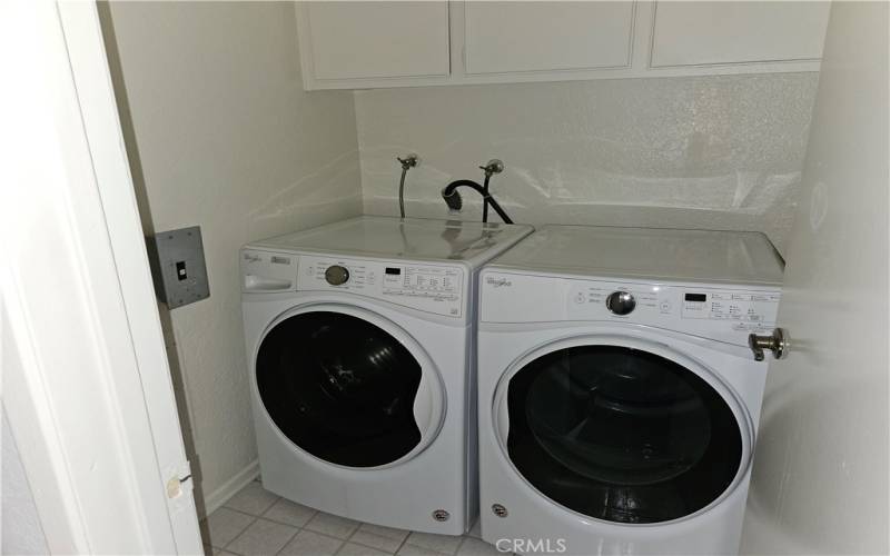 Laundry room between bedroom #2 and main bedroom