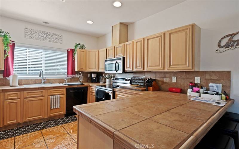 Beautiful tile counters & gorgeous spanish tile flooring