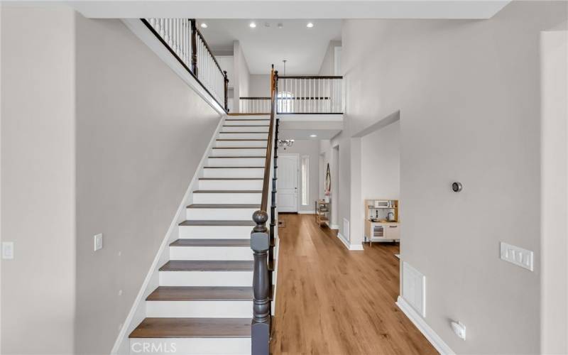 Looking back towards the front entry and view into the playroom