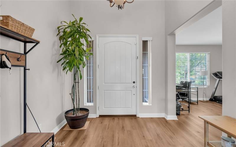 Front Entry and view into the front room being used as an office