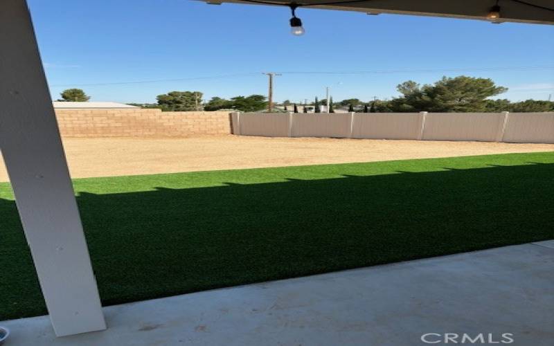 Inside view to rear yard showing brand new turf