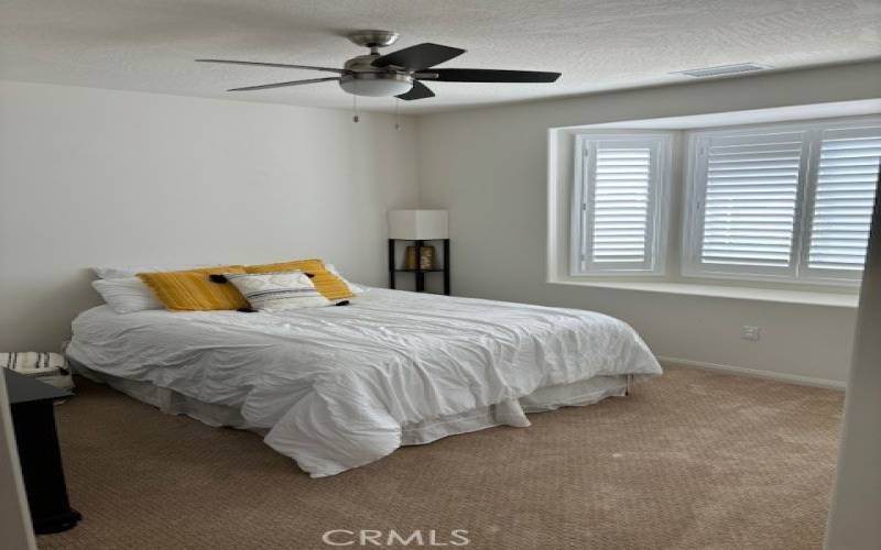 Bedroom one with bay window