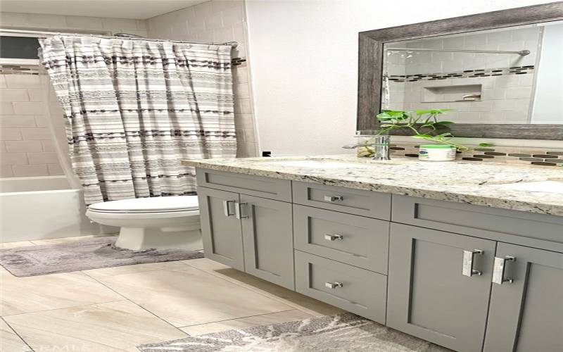 remodeled hallway bath has double sink vanity