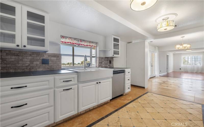 Kitchen is fresh, clean and ready to handle any large family meal prep.