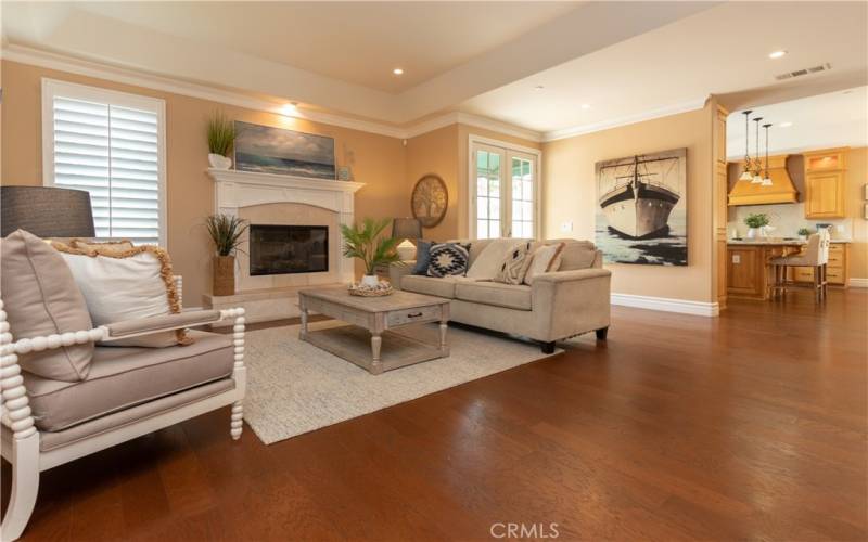 Spacious family room with a fireplace.