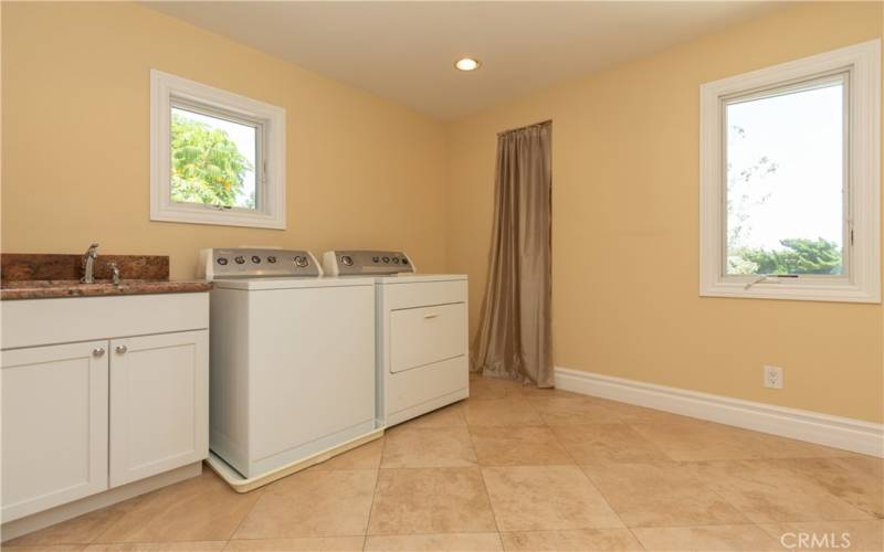 Upper level laundry room.