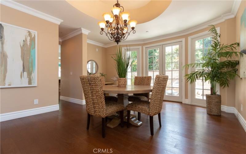 Gorgeous ceiling and natural light in the dining room.