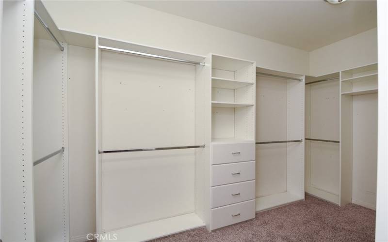 Primary closet with custom built-ins.