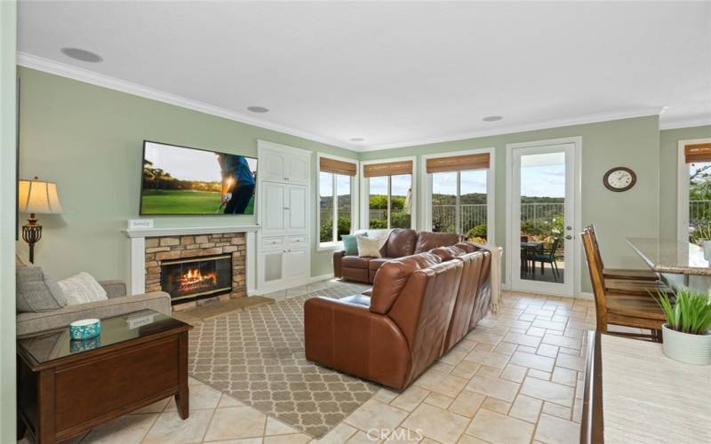Separate Family Room with Gas Log Fireplace and Surround Sound Ceiling Speakers