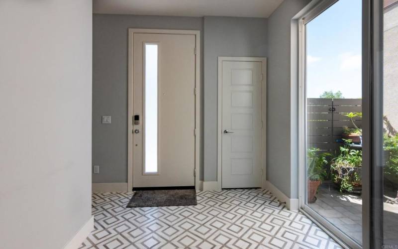 Foyer with marble tile flooring