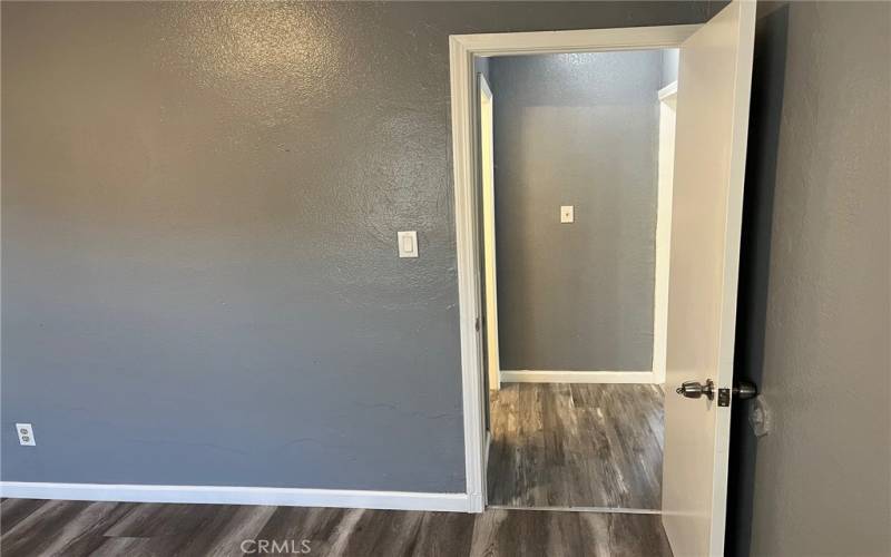 View into hall bath from living room