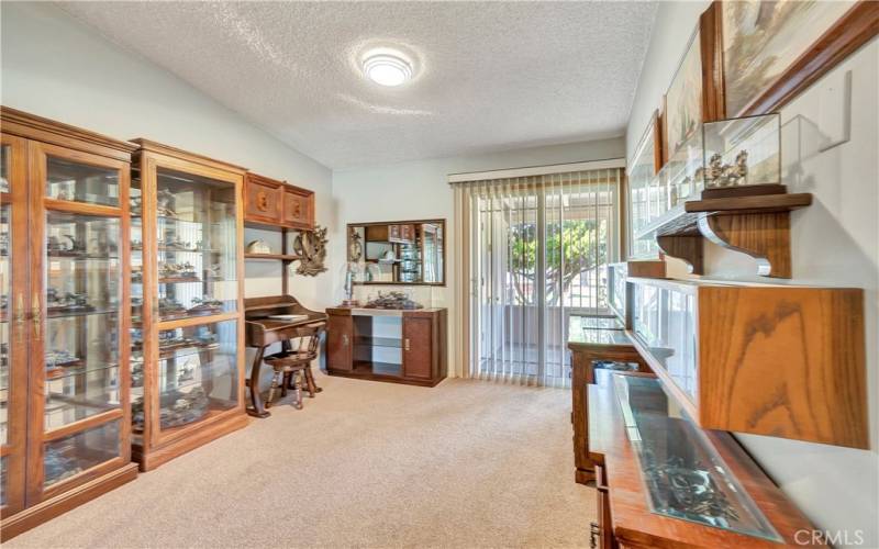 1st bedroom used as office. Sliding door to the front patio area.