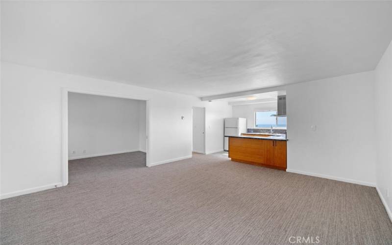 Pocket doors open to the one bedroom off the living room.