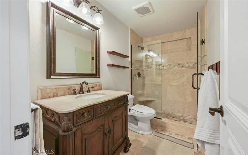 Upstairs Hall Bathroom - Upgraded Custom vanity, fixtures, lighting, shower, and flooring