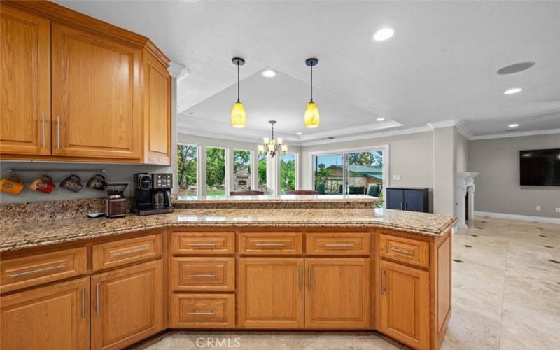 Huge upgraded kitchen is a chef's dream, complete with stainless steel appliances, a walk-in pantry, ample cabinets, and counter space