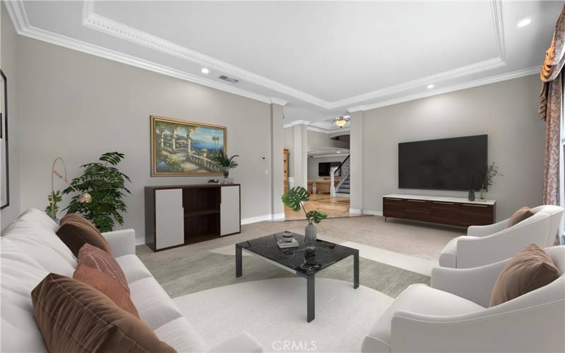 Virtually Staged - Living Room With soaring 11 ft coffered ceiling, remote-controlled blinds/shades, recessed lighting, and crown molding.