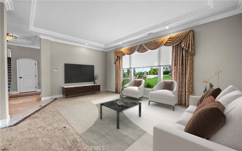 Virtually Staged - Living Room With soaring 11 ft coffered ceiling, remote-controlled blinds/shades, recessed lighting, and crown molding.