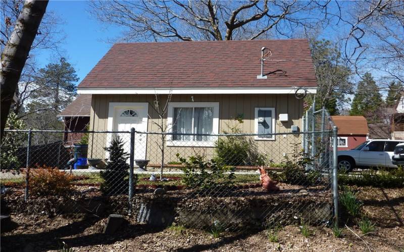 The garage is deteached and located in front of the home

