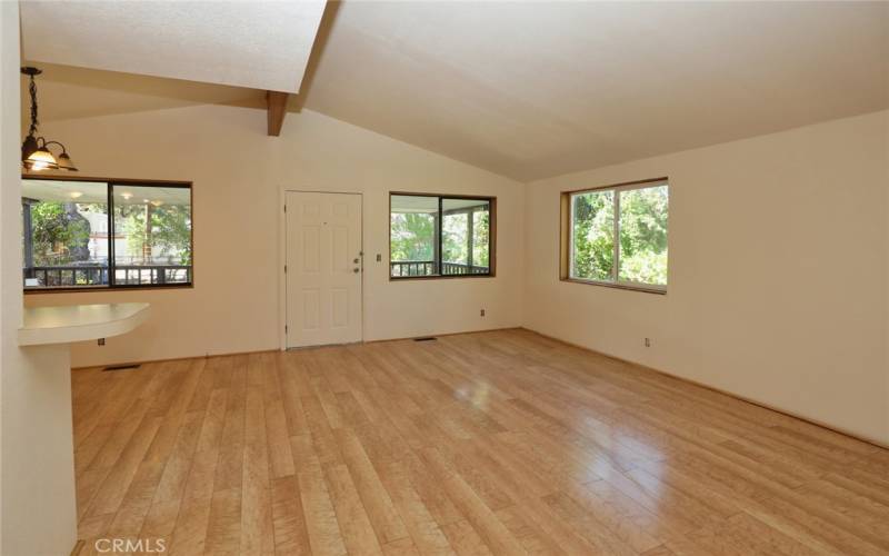 Living room facing front door entrance.