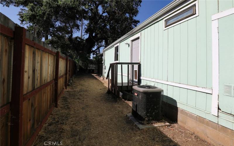 Walkway to access the backyard, and back door entrance,