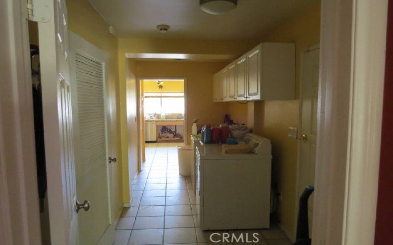 Laundry Area Entry to Kitchen & Exit to Side