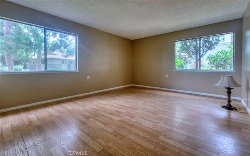 Primary bedroom, lots of windows and natural light