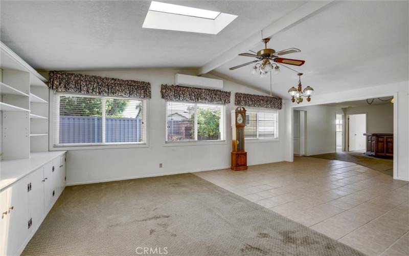 Newer Windows in the Family Room look out to the Backyard. AC unit keeps this room cool!