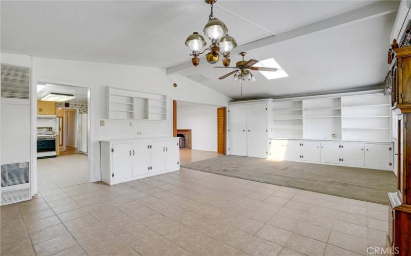 Bright and open Family Room/Dining Room with lots of Built-ins and Storage Space.