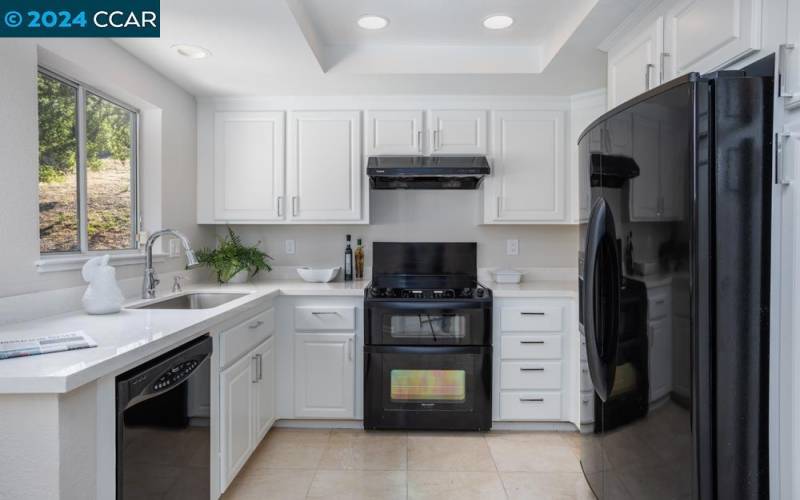 Newly painted kitchen with pull-out microwave