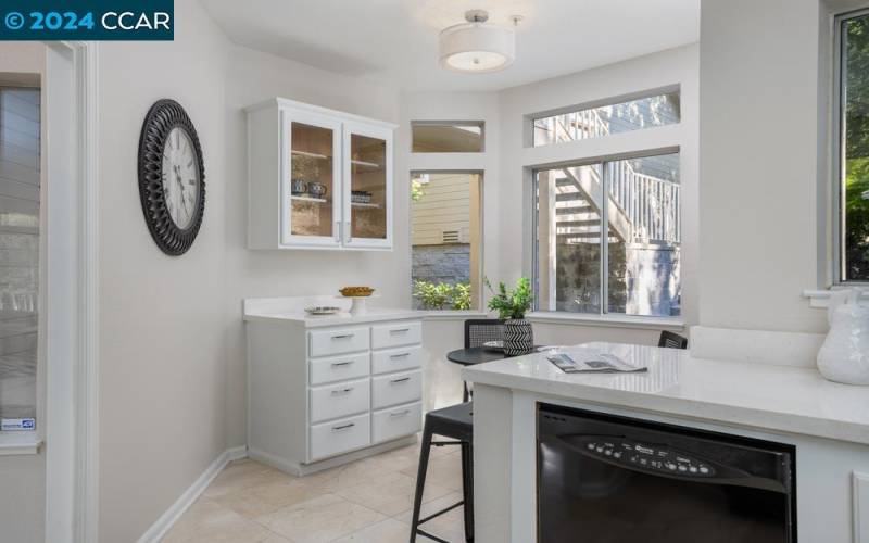 Breakfast nook has a custom hutch - so convenient!