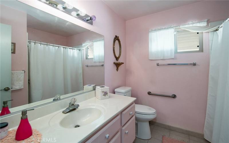 Hallway Bathroom with walk-in Shower