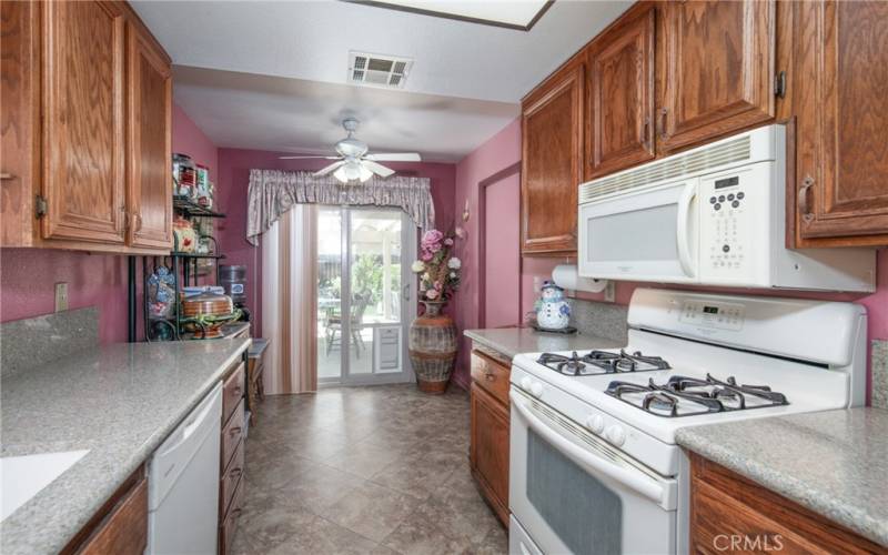 Dining area in the Kitchen with a slider to the backyard.