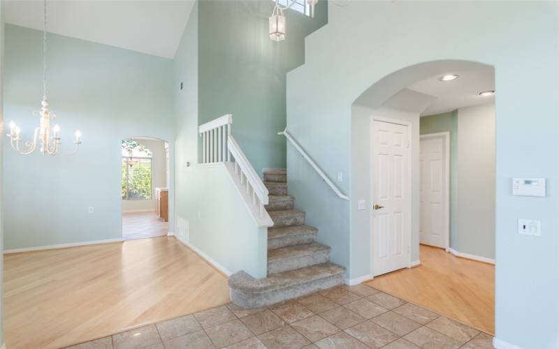 Dining (Left), Kitchen Through Doorway, Stairs To Large Loft, Beds/Baths & Garage Access To The Right.