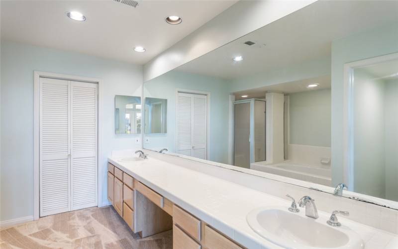 Primary Bath w/ Double Sinks, Large Walk-In Closet Doors.