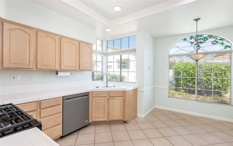 Bright Kitchen w/ Plenty Of Cabinets For Storage.