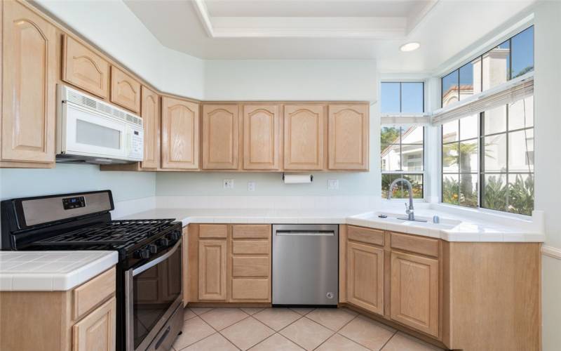 Kitchen w/ Double Sink. A Lot Of Cabinet Space.