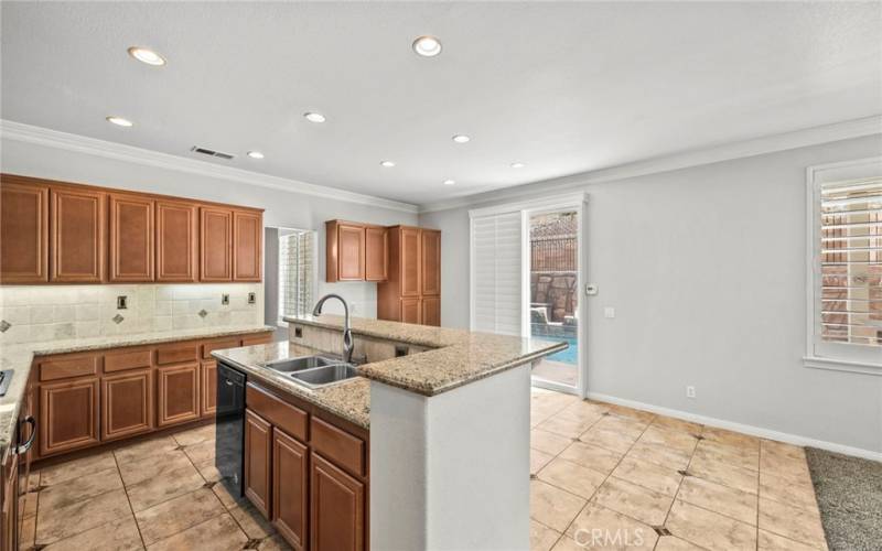 Inviting breakfast bar, designed for both style and function. The breakfast bar provides a chic setting where conversations can flow with your invited guest.