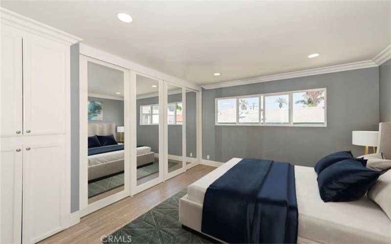 Large Primary bedroom with ocean breezes (virtually staged)