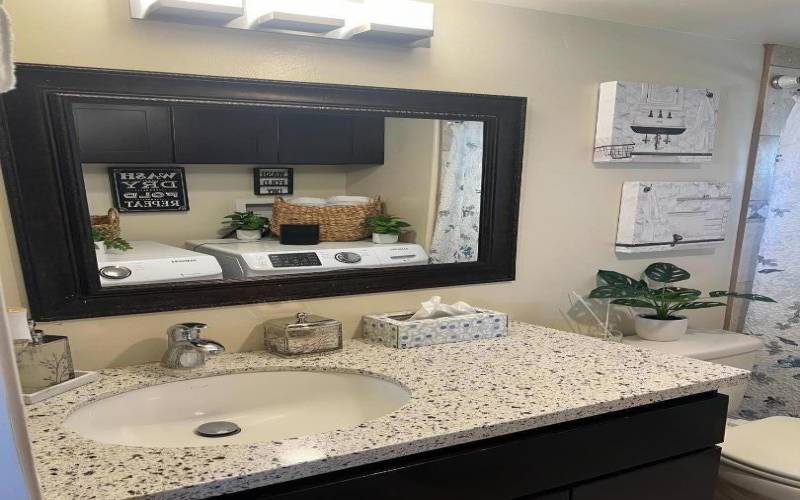 Renovated Bathroom that also is the laundry area