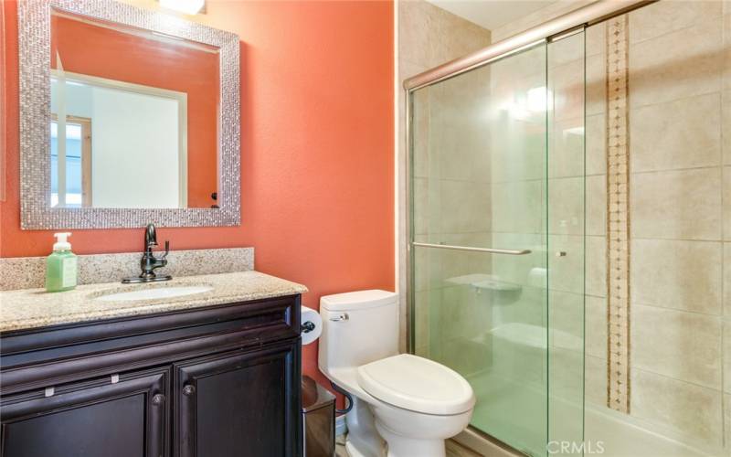 Bathroom #1 with Shower, Granite Vanity and Low Flow Toilet