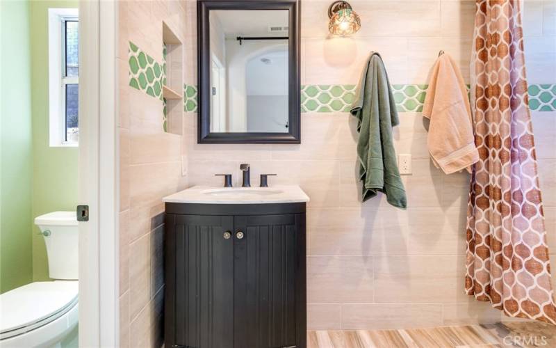 Primary Bathroom with Privacy Toilet and Quartz Top Vanity