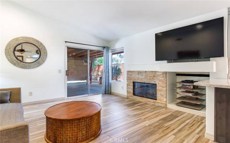 Family Area with Stacked Stone Gas Fireplace