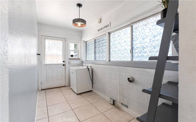 Laundry Room w/ Sink & Backdoor to the Backyard