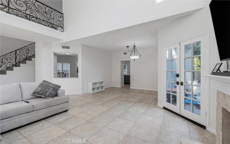 Living room looking into formal dining area