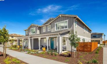 Photo is of the model home and not the actual homesite for sale.